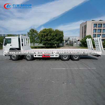 Sinotruk HOWO 8x4 400HP Flatbed Truck with 9m Manganese Steel Deck and Hydraulic Ramp for Heavy Machinery Transport