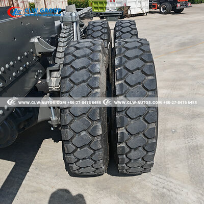 Sinotruk HOWO 8x4 400HP Flatbed Truck with 9m Manganese Steel Deck and Hydraulic Ramp for Heavy Machinery Transport